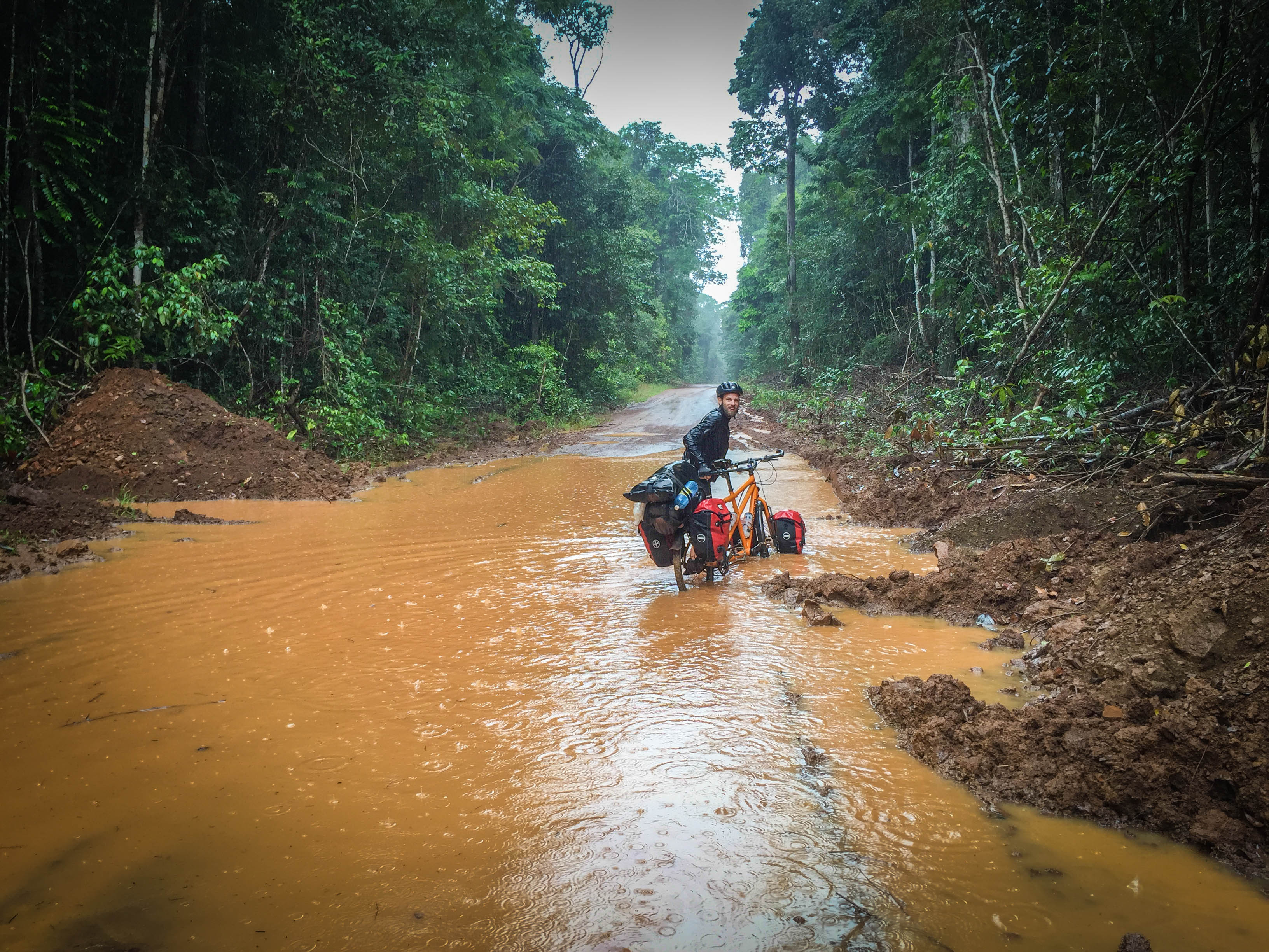 a man pulling a tandem in mood / Cycling through South America
